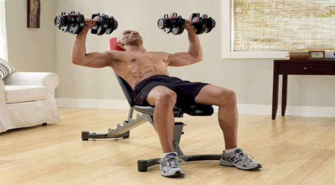 Exercising with Bowflex Dumbbells